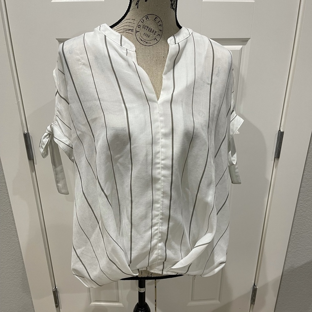 Women’s Listicle white and gray striped blouse.